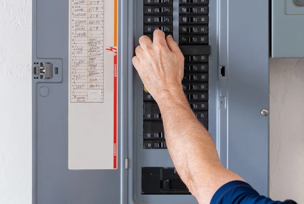 Cornerstone Pros electrician working at a Tampa Bay home